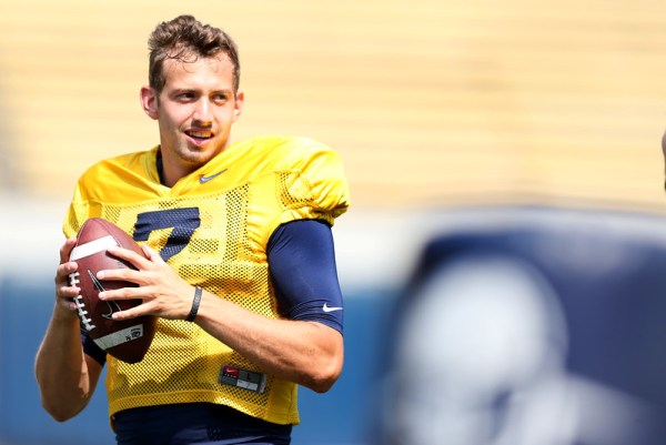 New Cal quarterback Davis Webb grabs a ball during practice at Memorial Stadium in Berkeley, Calif., on Friday, Aug. 19, 2016. (Ray Chavez/Bay Area News Group)