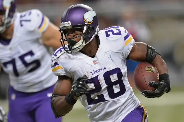 ST. LOUIS, MO - SEPTEMBER 7: Adrian Peterson #28 of the Minnesota Vikings rushes during a game against the St. Louis Rams at the Edward Jones Dome on September 7, 2014 in St. Louis, Missouri. (Photo by Michael B. Thomas/Getty Images)