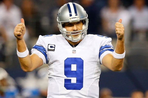 ARLINGTON, TX - JANUARY 04:  Tony Romo #9 of the Dallas Cowboys gestures against the Detroit Lions during the second half of their NFC Wild Card Playoff game at AT&T Stadium on January 4, 2015 in Arlington, Texas.  (Photo by Tom Pennington/Getty Images)