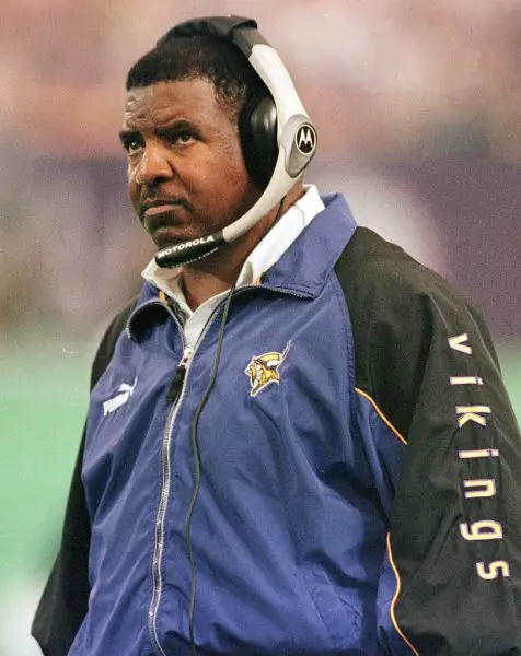Minnesota Vikings head coach Dennis Green looks up at the clock during a game against the Chicago Bears, Sept. 3, 2000, in Minneapolis. Green received a three-year contract extension from owner Red McComb, Wednesday, Sept. 27, 2000, until the 2004. (AP Photo/Tom Olmscheid)